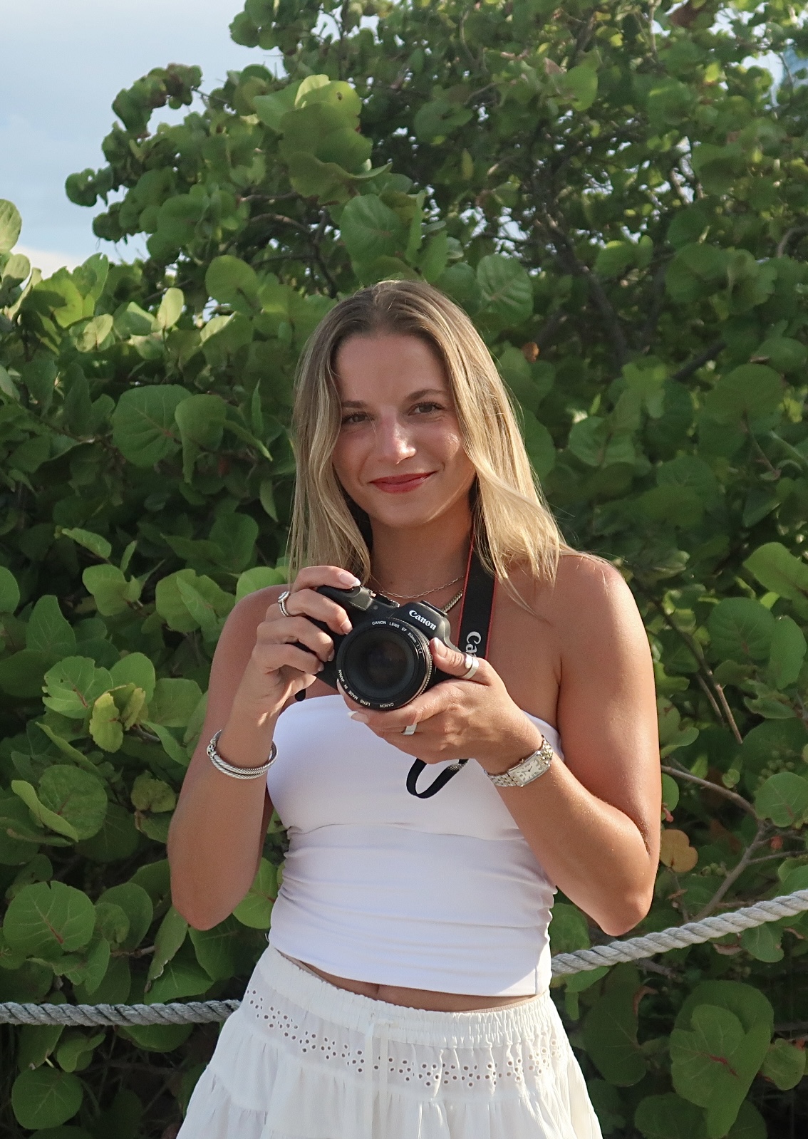 Portrait of the photographer holding a film camera